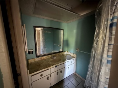 This 3-bedroom, 2-bathroom, 2-car garage home in Beacon Woods is on Beacon Woods Golf Club in Florida - for sale on GolfHomes.com, golf home, golf lot