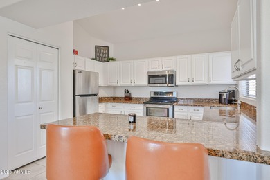 This lovely 2 bedroom, 2 bath townhome with an open layout & on Palm Valley Golf Club  in Arizona - for sale on GolfHomes.com, golf home, golf lot