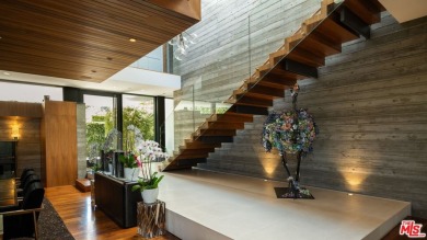 Nestled in the highly sought-after Riviera neighborhood of on Riviera Country Club in California - for sale on GolfHomes.com, golf home, golf lot