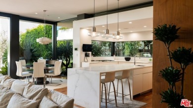 Nestled in the highly sought-after Riviera neighborhood of on Riviera Country Club in California - for sale on GolfHomes.com, golf home, golf lot