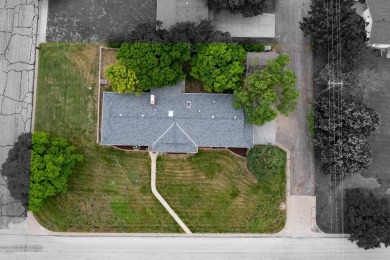 This stunning 4-bed, 3-bath ranch is perched directly across on Ellis Country Club in Kansas - for sale on GolfHomes.com, golf home, golf lot