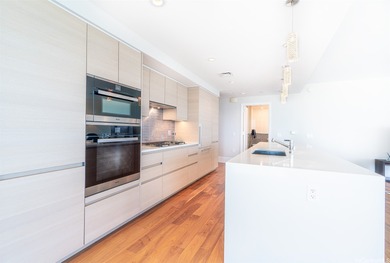 Anaha #1401 is a stunning and spacious 3-bedroom, 3-bath corner on Ala Wai Golf Course in Hawaii - for sale on GolfHomes.com, golf home, golf lot