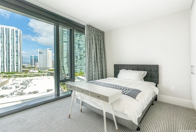 Anaha #1401 is a stunning and spacious 3-bedroom, 3-bath corner on Ala Wai Golf Course in Hawaii - for sale on GolfHomes.com, golf home, golf lot