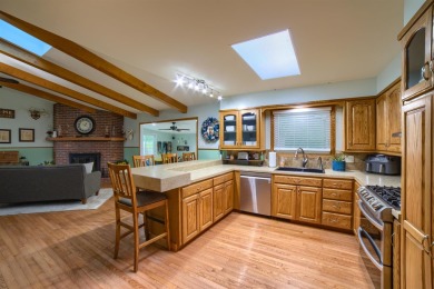 This stunning 4-bed, 3-bath ranch is perched directly across on Ellis Country Club in Kansas - for sale on GolfHomes.com, golf home, golf lot