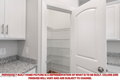 This brand-new home, currently under construction and expected on The Lakes Country Club in North Carolina - for sale on GolfHomes.com, golf home, golf lot