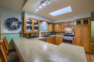 This stunning 4-bed, 3-bath ranch is perched directly across on Ellis Country Club in Kansas - for sale on GolfHomes.com, golf home, golf lot