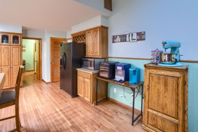 This stunning 4-bed, 3-bath ranch is perched directly across on Ellis Country Club in Kansas - for sale on GolfHomes.com, golf home, golf lot