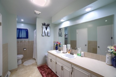 This stunning 4-bed, 3-bath ranch is perched directly across on Ellis Country Club in Kansas - for sale on GolfHomes.com, golf home, golf lot