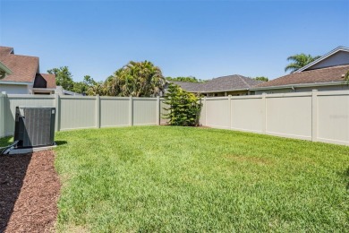 Welcome to Your WESTCHASE Dream Home!  Located in the heart of on Westchase Golf Club in Florida - for sale on GolfHomes.com, golf home, golf lot