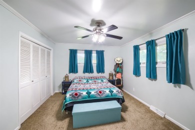 This stunning 4-bed, 3-bath ranch is perched directly across on Ellis Country Club in Kansas - for sale on GolfHomes.com, golf home, golf lot