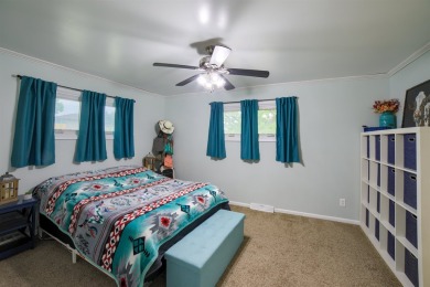 This stunning 4-bed, 3-bath ranch is perched directly across on Ellis Country Club in Kansas - for sale on GolfHomes.com, golf home, golf lot
