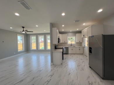 This adorable brand new three-bedroom home is perfect for your on Lamar Golf Course in Texas - for sale on GolfHomes.com, golf home, golf lot