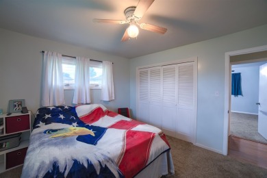 This stunning 4-bed, 3-bath ranch is perched directly across on Ellis Country Club in Kansas - for sale on GolfHomes.com, golf home, golf lot