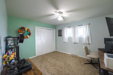 This stunning 4-bed, 3-bath ranch is perched directly across on Ellis Country Club in Kansas - for sale on GolfHomes.com, golf home, golf lot