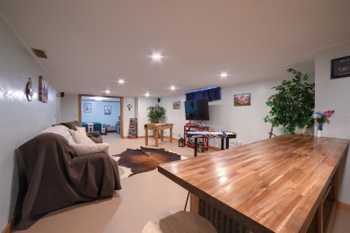 This stunning 4-bed, 3-bath ranch is perched directly across on Ellis Country Club in Kansas - for sale on GolfHomes.com, golf home, golf lot