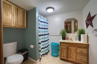 This stunning 4-bed, 3-bath ranch is perched directly across on Ellis Country Club in Kansas - for sale on GolfHomes.com, golf home, golf lot