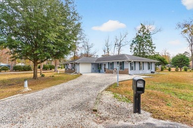 This charming 3-bedroom, 2-bath home is perfectly situated on a on Carolina Shores Golf Course in North Carolina - for sale on GolfHomes.com, golf home, golf lot