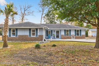 This charming 3-bedroom, 2-bath home is perfectly situated on a on Carolina Shores Golf Course in North Carolina - for sale on GolfHomes.com, golf home, golf lot