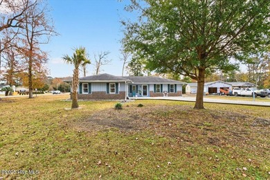 This charming 3-bedroom, 2-bath home is perfectly situated on a on Carolina Shores Golf Course in North Carolina - for sale on GolfHomes.com, golf home, golf lot