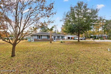 This charming 3-bedroom, 2-bath home is perfectly situated on a on Carolina Shores Golf Course in North Carolina - for sale on GolfHomes.com, golf home, golf lot