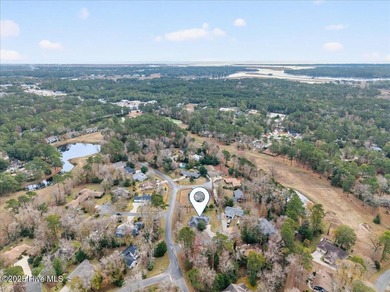 This charming 3-bedroom, 2-bath home is perfectly situated on a on Carolina Shores Golf Course in North Carolina - for sale on GolfHomes.com, golf home, golf lot