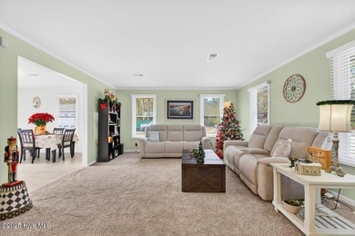 This charming 3-bedroom, 2-bath home is perfectly situated on a on Carolina Shores Golf Course in North Carolina - for sale on GolfHomes.com, golf home, golf lot