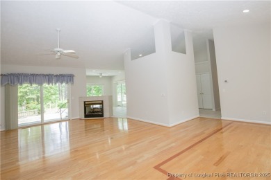 Nestled in the desirable Whispering Pines community and backing on Whispering Woods in North Carolina - for sale on GolfHomes.com, golf home, golf lot