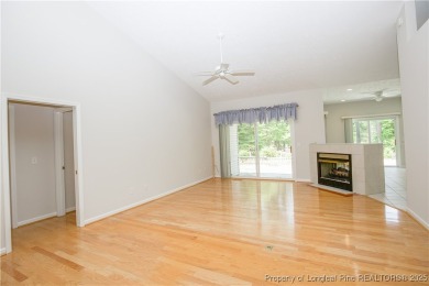 Nestled in the desirable Whispering Pines community and backing on Whispering Woods in North Carolina - for sale on GolfHomes.com, golf home, golf lot