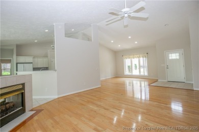Nestled in the desirable Whispering Pines community and backing on Whispering Woods in North Carolina - for sale on GolfHomes.com, golf home, golf lot