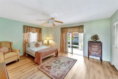 Light and bright 1BR/1.5BA corner unit in a 55+ development on The American Golf Club in Florida - for sale on GolfHomes.com, golf home, golf lot