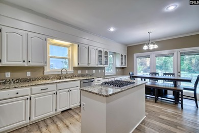 Welcome to the Woodlands! This all brick gem features golf on The Woodlands Country Club in South Carolina - for sale on GolfHomes.com, golf home, golf lot