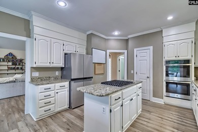 Welcome to the Woodlands! This all brick gem features golf on The Woodlands Country Club in South Carolina - for sale on GolfHomes.com, golf home, golf lot