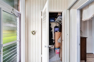 Light and bright 1BR/1.5BA corner unit in a 55+ development on The American Golf Club in Florida - for sale on GolfHomes.com, golf home, golf lot