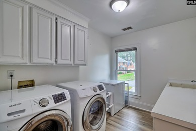 Welcome to the Woodlands! This all brick gem features golf on The Woodlands Country Club in South Carolina - for sale on GolfHomes.com, golf home, golf lot