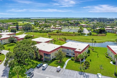 Light and bright 1BR/1.5BA corner unit in a 55+ development on The American Golf Club in Florida - for sale on GolfHomes.com, golf home, golf lot