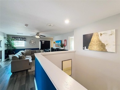 Exceptional vacation home, incredible value! Turnkey and fully on The Oasis Club at Champions Gate in Florida - for sale on GolfHomes.com, golf home, golf lot