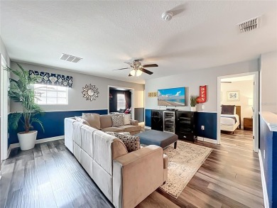 Exceptional vacation home, incredible value! Turnkey and fully on The Oasis Club at Champions Gate in Florida - for sale on GolfHomes.com, golf home, golf lot