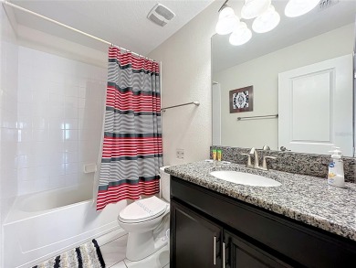 Exceptional vacation home, incredible value! Turnkey and fully on The Oasis Club at Champions Gate in Florida - for sale on GolfHomes.com, golf home, golf lot