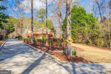 NEW PRICE. Discover your secluded retreat on the shores of on Turtle Cove Golf Course in Georgia - for sale on GolfHomes.com, golf home, golf lot