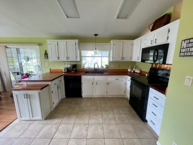 This 2 Bedroom, 2 Bath split floor plan is open and light and on Water Oak Country Club Estates in Florida - for sale on GolfHomes.com, golf home, golf lot