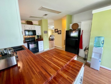 This 2 Bedroom, 2 Bath split floor plan is open and light and on Water Oak Country Club Estates in Florida - for sale on GolfHomes.com, golf home, golf lot