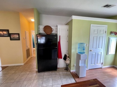 This 2 Bedroom, 2 Bath split floor plan is open and light and on Water Oak Country Club Estates in Florida - for sale on GolfHomes.com, golf home, golf lot