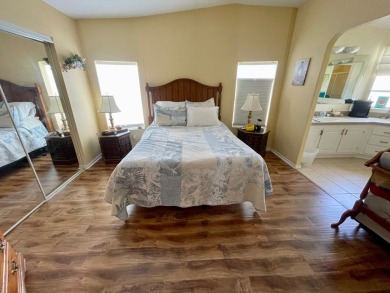 This 2 Bedroom, 2 Bath split floor plan is open and light and on Water Oak Country Club Estates in Florida - for sale on GolfHomes.com, golf home, golf lot