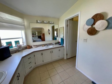 This 2 Bedroom, 2 Bath split floor plan is open and light and on Water Oak Country Club Estates in Florida - for sale on GolfHomes.com, golf home, golf lot