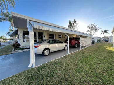 This charming 2-bedroom, 2-bath home offers 960 sq ft of living on Fairway Village Golf Course in Florida - for sale on GolfHomes.com, golf home, golf lot