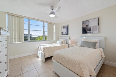 Stunning corner unit condo in the desirable Park Place 55+ on Pembroke Lakes Golf Club in Florida - for sale on GolfHomes.com, golf home, golf lot