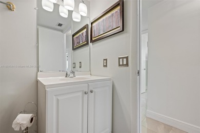 Stunning corner unit condo in the desirable Park Place 55+ on Pembroke Lakes Golf Club in Florida - for sale on GolfHomes.com, golf home, golf lot