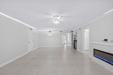 Step into luxury with this beautifully renovated, nearly 1,600 on Fountains Golf and Country Club in Florida - for sale on GolfHomes.com, golf home, golf lot