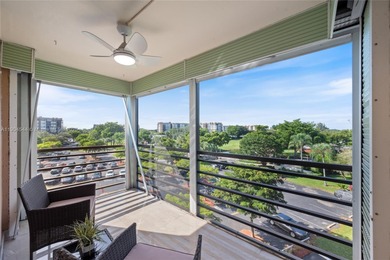 Stunning corner unit condo in the desirable Park Place 55+ on Pembroke Lakes Golf Club in Florida - for sale on GolfHomes.com, golf home, golf lot