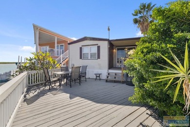 Welcome to 677 E Clam Circle, a beautifully updated coastal on Long Island Golf Course in Texas - for sale on GolfHomes.com, golf home, golf lot